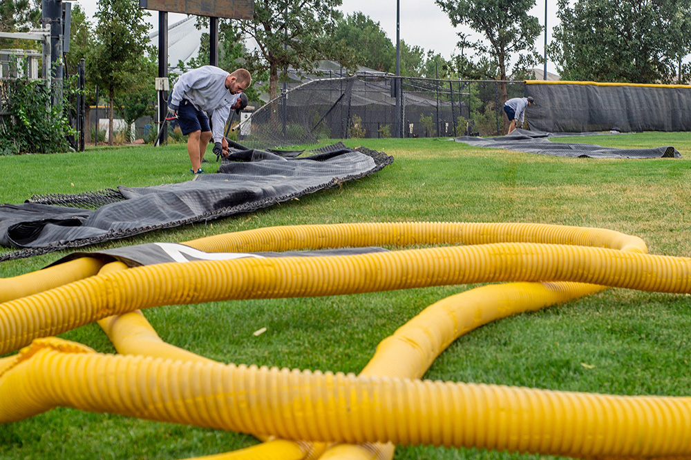 Crews working to repair blown over ballfield fence at Redstone Park